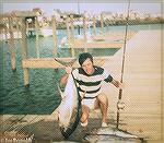 Joe Reynolds back at the dock at Shantytown in Ocean City, Maryland with a yellowfin tuna. Early 80s.