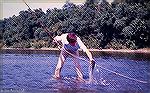 An image from the late 1960s. Joe Reynolds smallmouth bass fishing on the Potomac River near Brunswick.