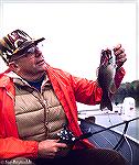 Chuck Edghill shows a smallmouth, caught somewhere in Maryland but I can't remember where. Probably in 1970s.