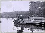 February 1969. Joe Reynolds in a very tippy boat on Johnson Pond on Maryland's Eastern Shore. Chain Pickerel.