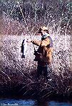 Fishing buddy Bob Blatchley with a nice largemouth bass caught in a small pond after a morning of goose hunting. 1980ish.