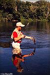 Steve Weinstein fishes the Potomac River just below Brunswick bridge for smallmouth bass. Mid 80s.