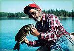 My Arizona fishing buddy and outdoor writer Tony Mandile with a smallmouth from a fly-in lake in Ontario. Late 70s.