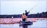 Earrl Shelsby (left) and Joe Reynolds fish the Blackwater River on Maryland's Eastern Shore. Early 70s.