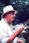 Simeon Yaruta trout fishing on Big Hunting Creek just north of Frederick, Maryland in August 1984. Simeon and artist Frank Smoot were best friends, and both rarely seen without a pipe.