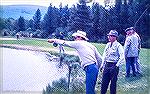 Legenday Orvis bamboo rod maker Wes Jordan checks out Wayne Grauer's casting style at an Orvis pond in Vermont. June 1968. Photo taken during a trip to Cortland and Orvis with Tom Cooney, Wayne Grauer