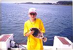 Young man with a flounder caught in South Bay near Ocean City, Maryland.
