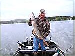 Eric Richter shows a nice Deep Creek Lake pike caught in May 2013. Photo by Eric Richter.